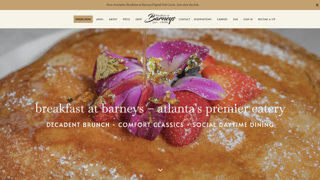 Breakfast at Barney's restaurant exterior with neon sign